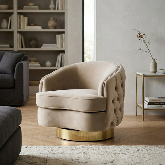 Beige armchair with gold base in a living room setting