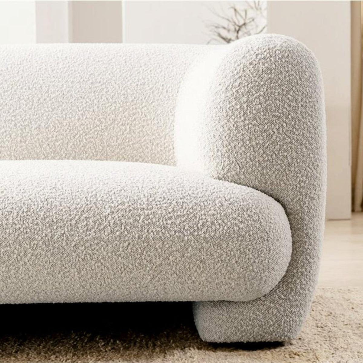 Textured beige sofa in a living room setting