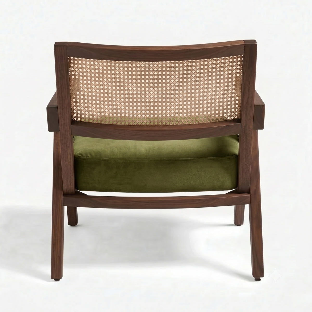 Wooden chair with wicker backrest and green cushion on a white background