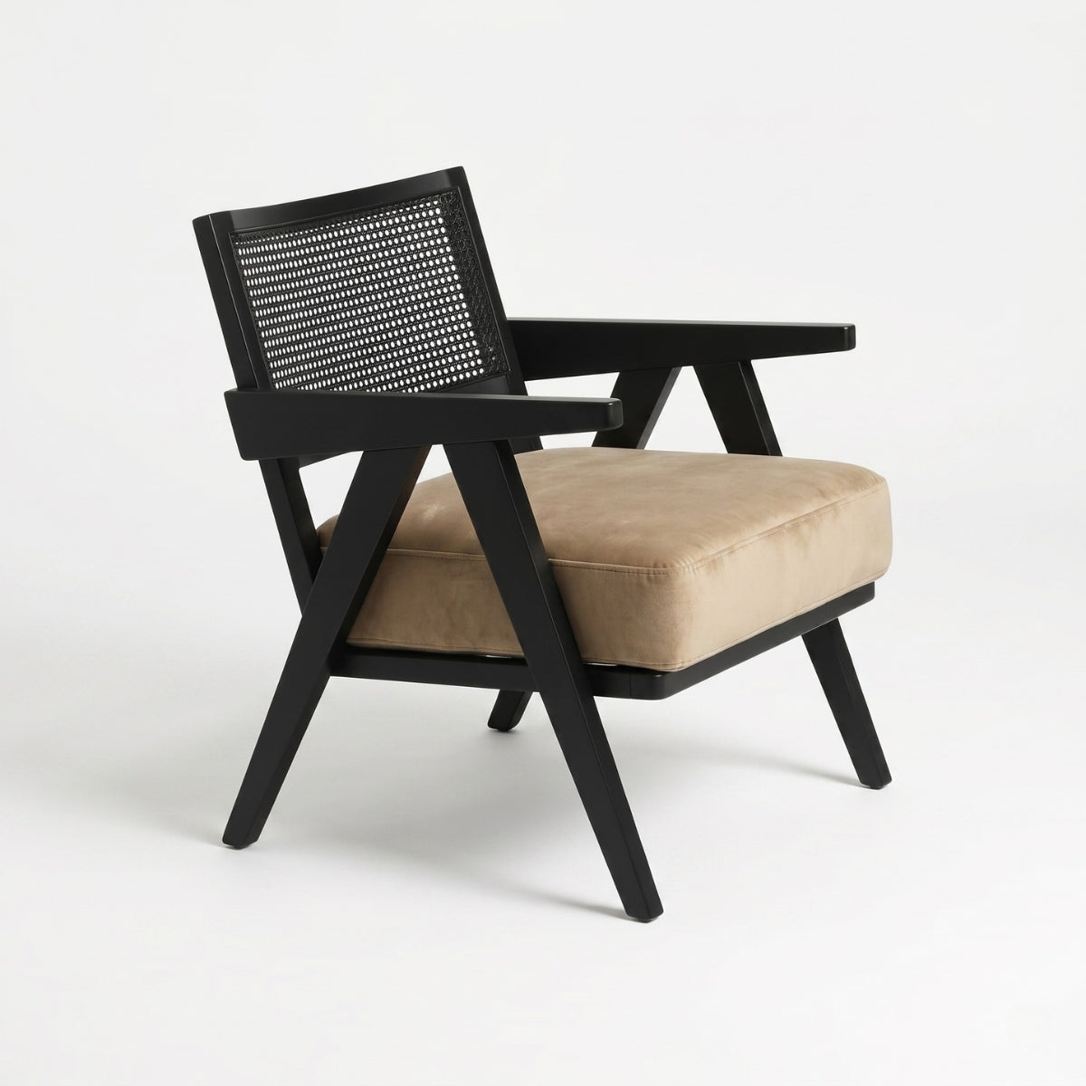 Chair with black frame and beige cushion on a white background