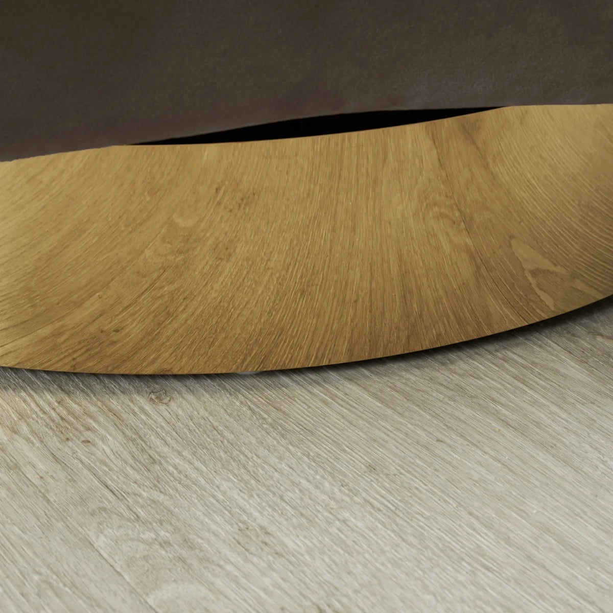 Wooden surface on a gray floor
