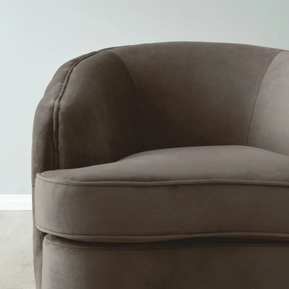 Brown upholstered chair against a light gray background