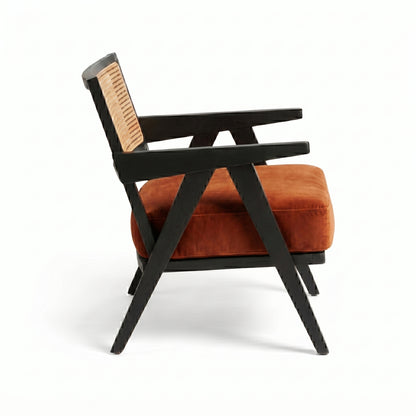 Chair with orange cushion and black frame on a white background