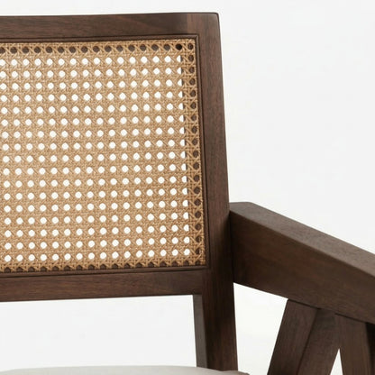 Wooden chair with wicker backrest on a white background