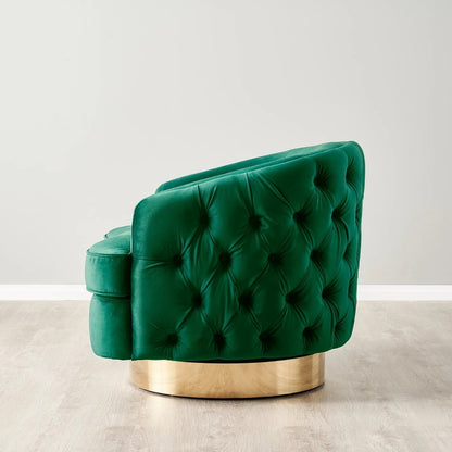 Green tufted chair with gold base on a light gray background