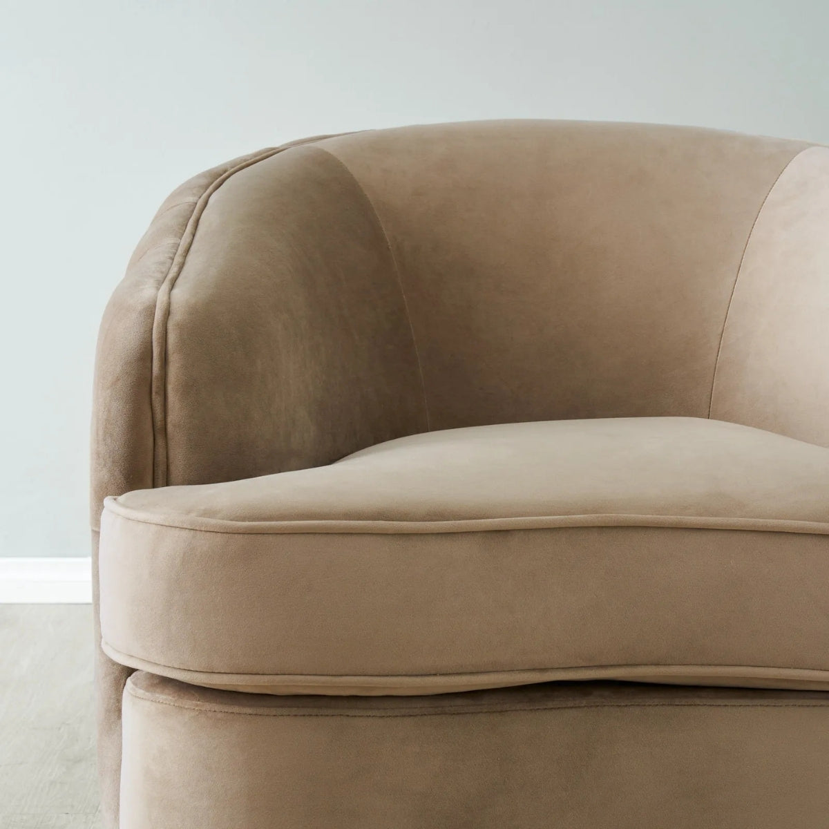 Beige sofa with a neutral background