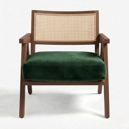 Chair with wooden frame and green cushion on a white background