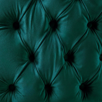 Close-up of a green tufted velvet surface