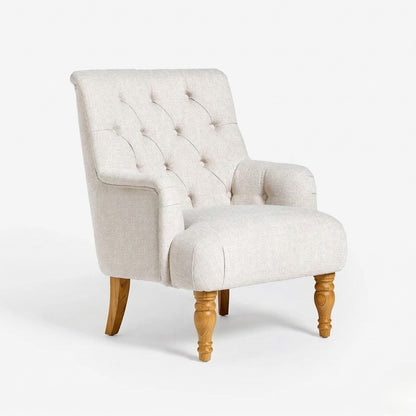 Beige armchair with wooden legs on a white background