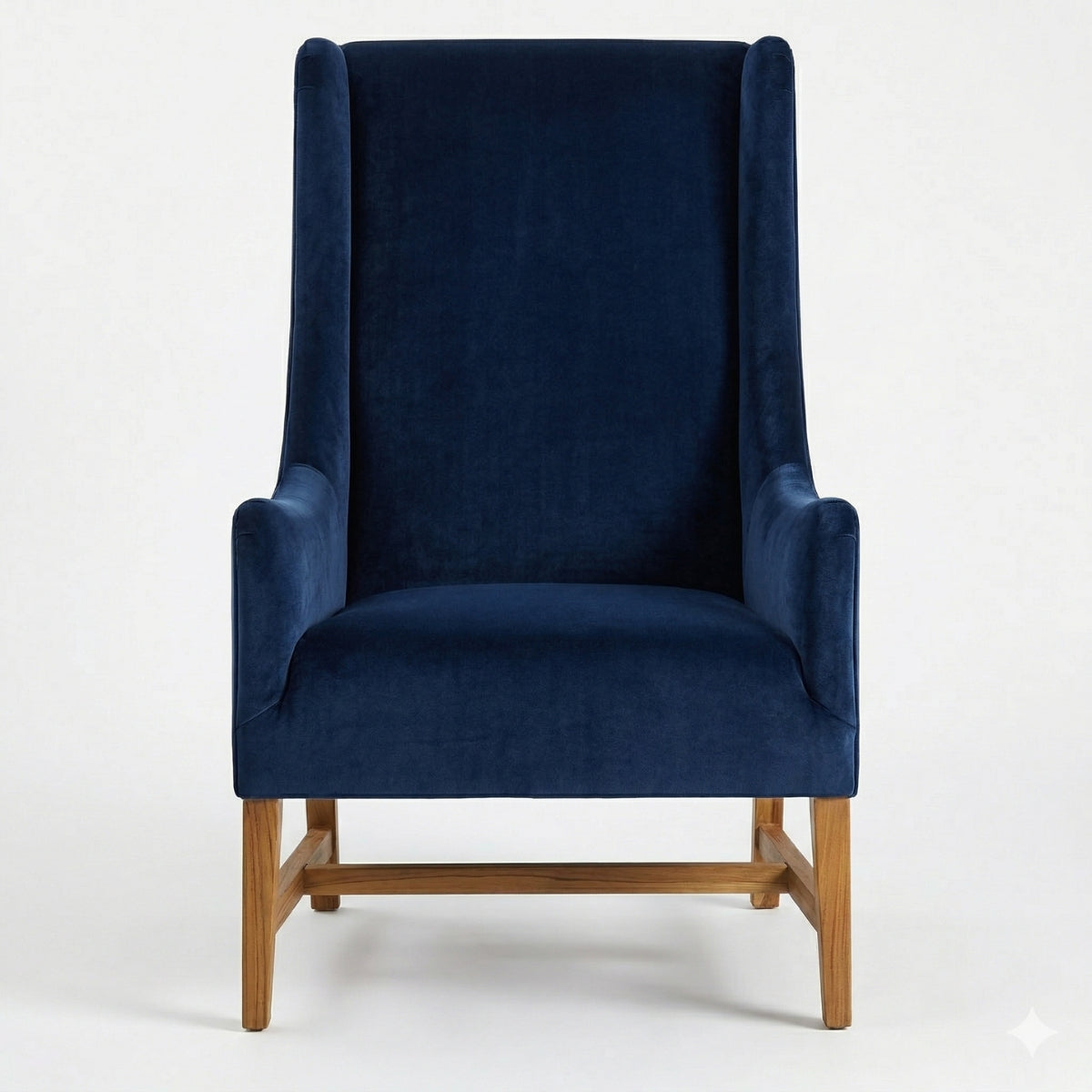 Blue wingback chair with wooden legs on a white background