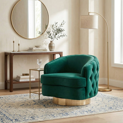 Green velvet armchair in a stylish living room with a round mirror, lamp, and side table.