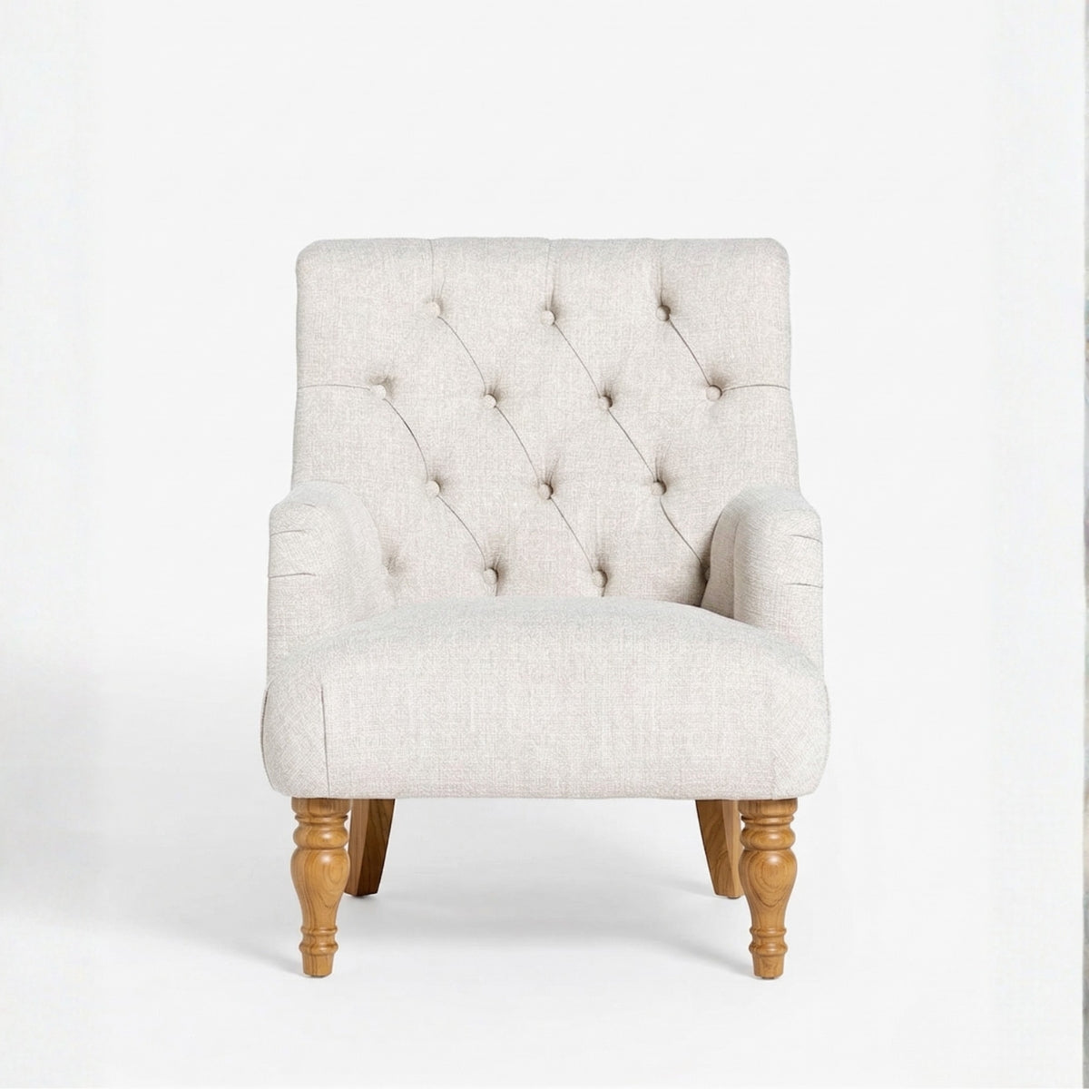 Beige upholstered chair with wooden legs on a white background