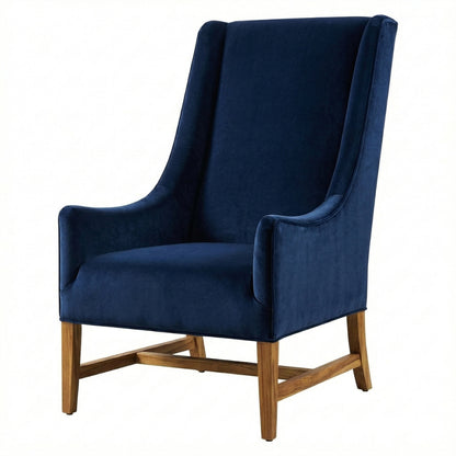 Blue upholstered chair with wooden legs on a white background